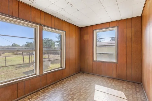a view of an empty room and window