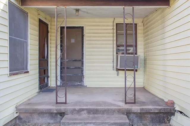 a front view of a house with a shower