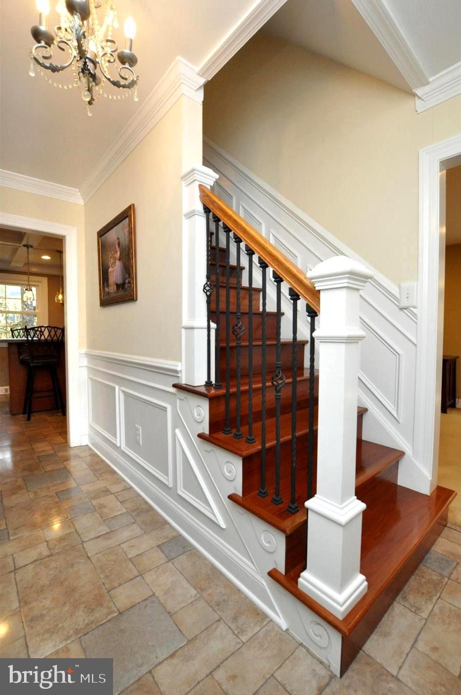 1346 Stokes Road Medford, NJ 08055 - Photo 2 of 40 Foyer with wainscoting custom spindles