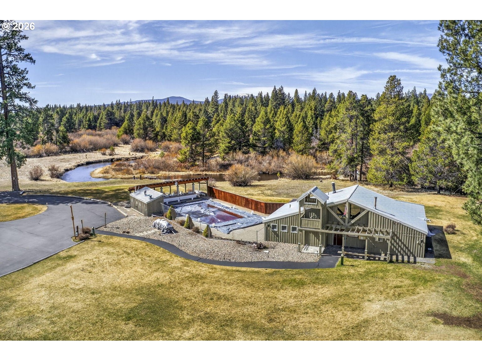 Pannier Court La Pine, OR 97739 - Photo 7 of 11 a view of a swimming pool with an outdoor seating