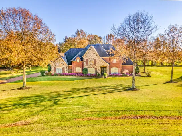a view of an swimming pool with an outdoor space