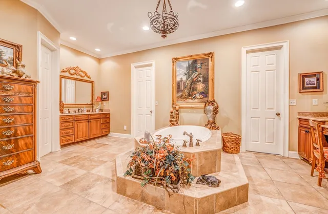 a living room with fireplace furniture and a window