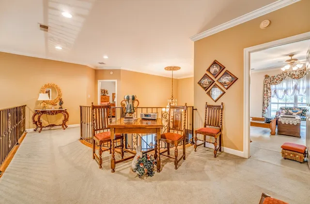 a view of a lobby with furniture and a rug