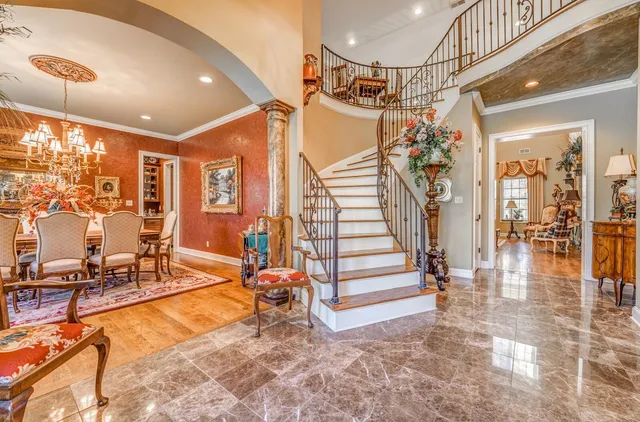 a view of a livingroom with furniture and a rug