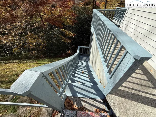 a view of balcony with wooden floor