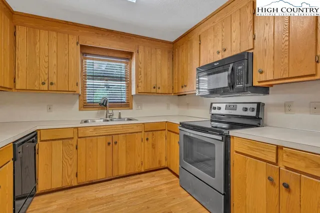a view of balcony with wooden floor