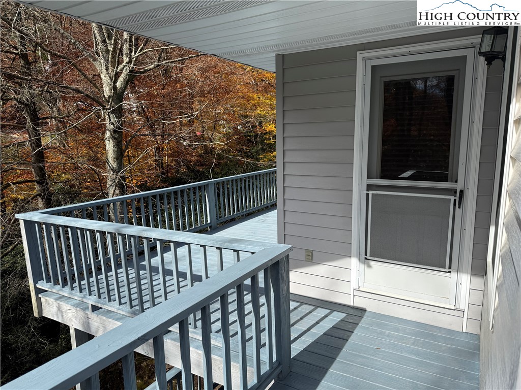 450 Astor Cook Road Blowing Rock, NC 28605 - Photo 9 of 39 a view of balcony with wooden floor