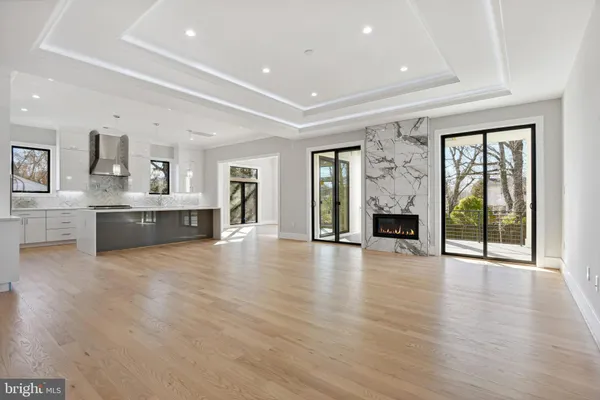 a kitchen with cabinets and stainless steel appliances