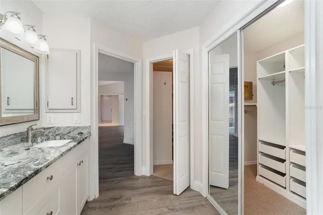 a view of a swimming pool with outdoor seating