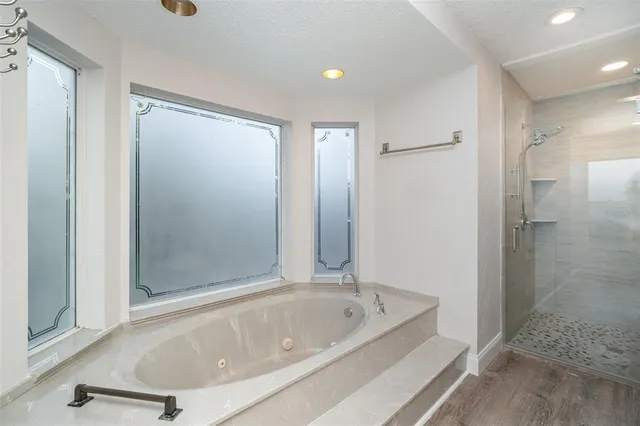 a view of indoor pool and sitting area