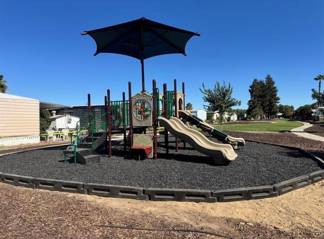 2845 East Hatch Road, Unit 84 Ceres, CA 95351 - Photo 38 of 39 a view of a slide