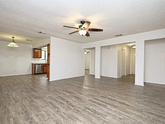 10406 Macmora Road Austin, TX 78758 - Photo 3 of 9 a view of an empty room with a window