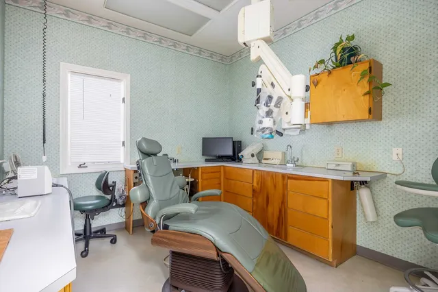 a bedroom with a bed and a mirror