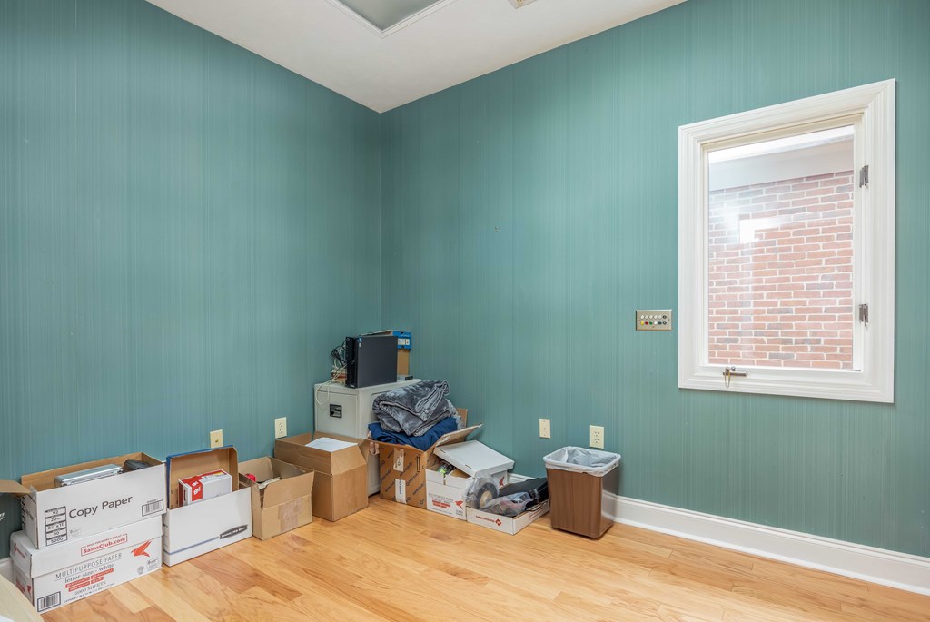3612 Edgewood Road Columbus, GA 31907 - Photo 19 of 29 a room with a wooden floor and a window