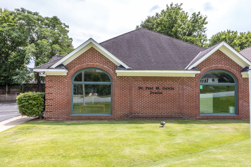 3612 Edgewood Road Columbus, GA 31907 - Photo 3 of 29 a front view of a house with a yard and garage