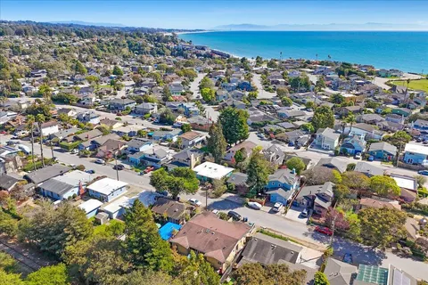 an aerial view of a city with lots of residential buildings