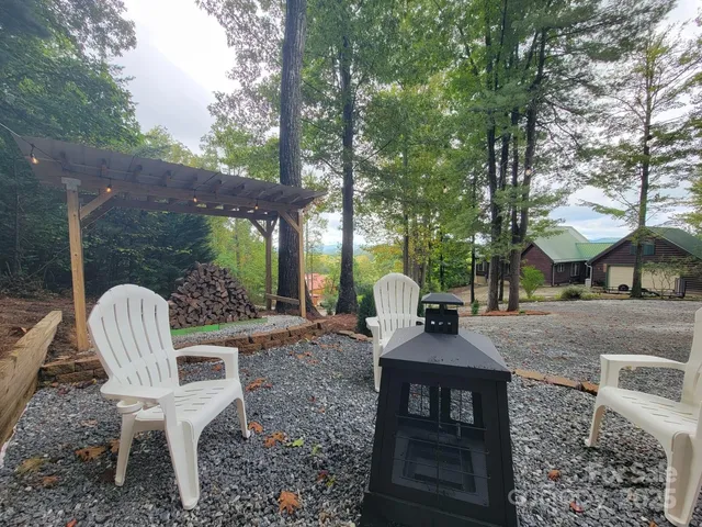 a view of a bench in the backyard