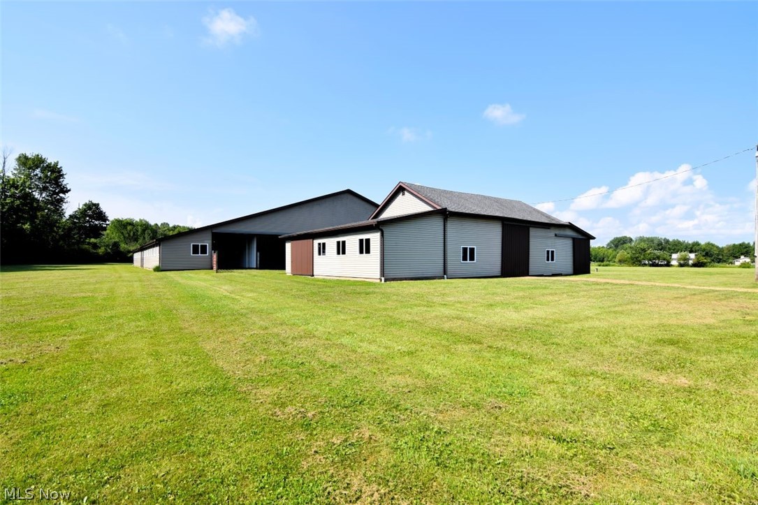 15227 Leroy Road Thompson, OH 44086 - Photo 7 of 50 Pole barn with indoor riding arena, 13 stables, hayloft, tool shed and more.