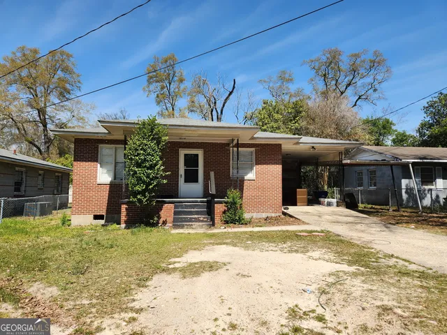 a view of a house with a patio