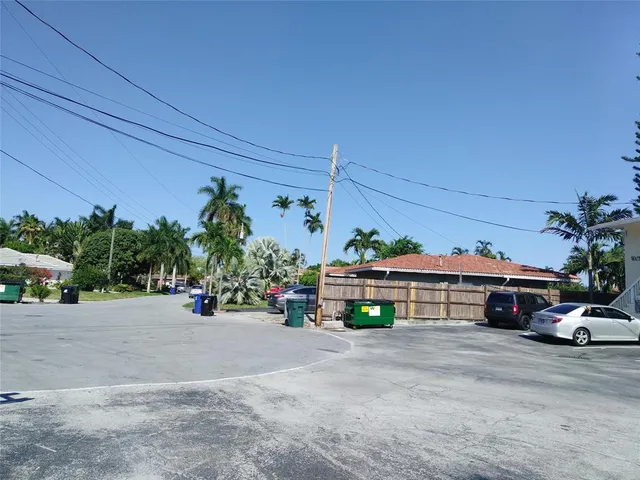 a view of a street with cars