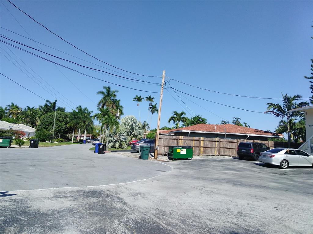 5810 Northeast 14th Road, Unit 6 Fort Lauderdale, FL 33334 - Photo 9 of 9 a view of a street with cars
