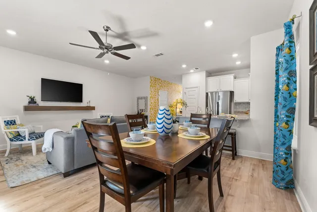a view of a dining room with furniture