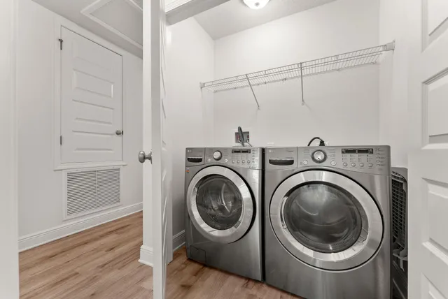 a utility room with dryer and washer