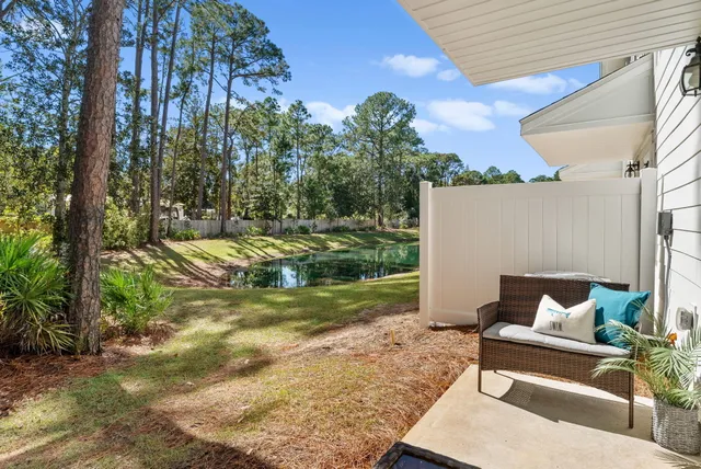a view of a yard with furniture