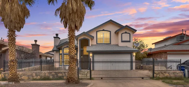 a front view of a house with parking