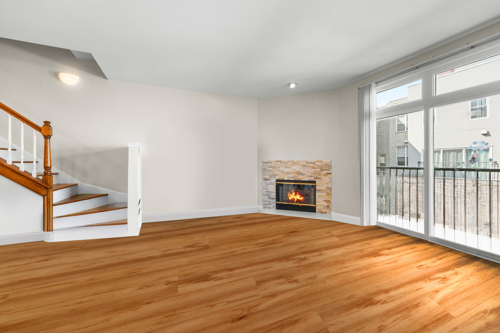 5230 South University Avenue, Unit D Chicago, IL 60615 - Photo 3 of 18 a view of an empty room with wooden floor and a window