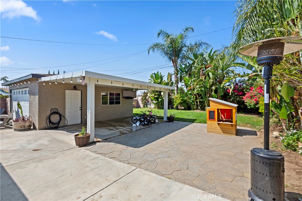 1705 Jeryl Avenue Colton, CA 92324 - Photo 20 of 24 a view of a house with backyard and sitting area