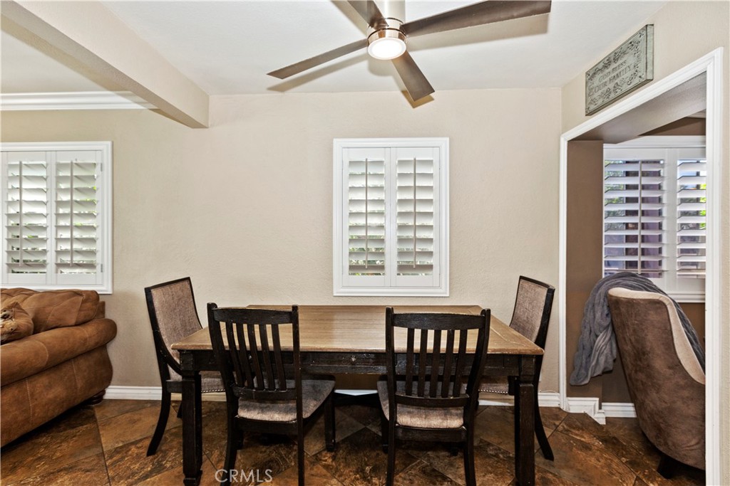 1705 Jeryl Avenue Colton, CA 92324 - Photo 6 of 24 a view of a dining room with furniture window and outside view