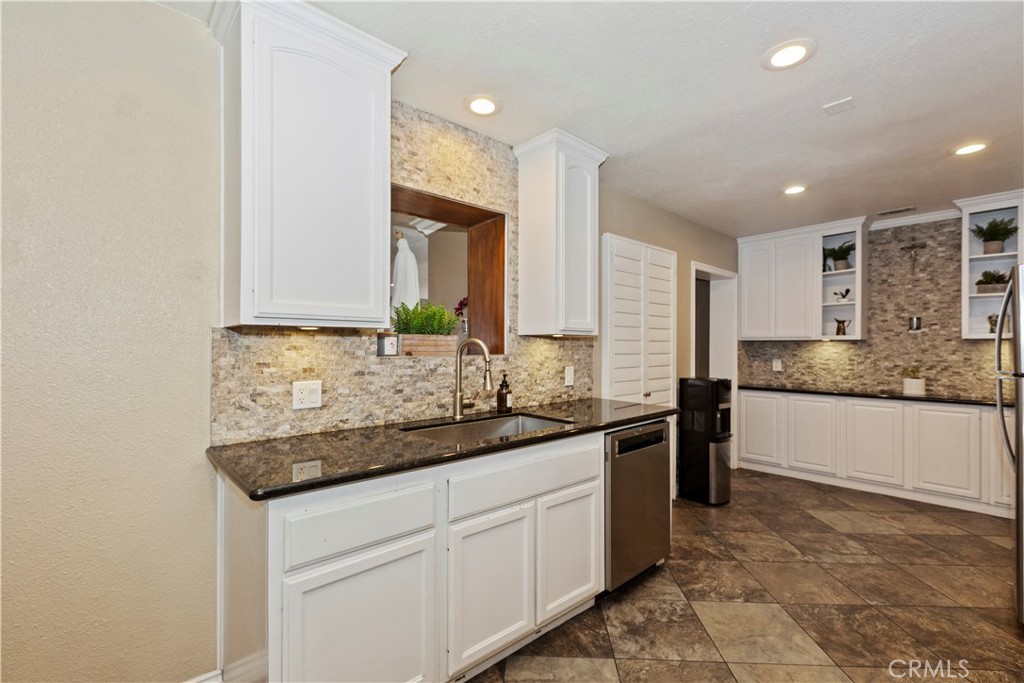1705 Jeryl Avenue Colton, CA 92324 - Photo 9 of 24 a kitchen with a sink and cabinets