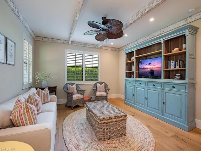 a bathroom with a granite countertop sink mirror and vanity