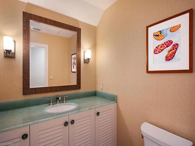 a bed room with a bed and a large window