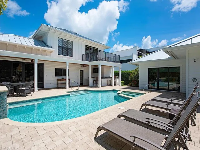 a kitchen with a stove and a refrigerator