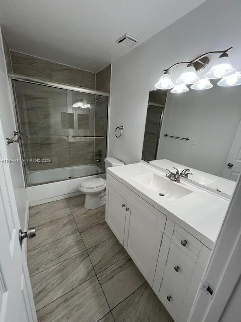 18336 Northwest 68th Avenue, Unit E Hialeah, FL 33015 - Photo 9 of 9 a bathroom with a double vanity sink mirror and shower