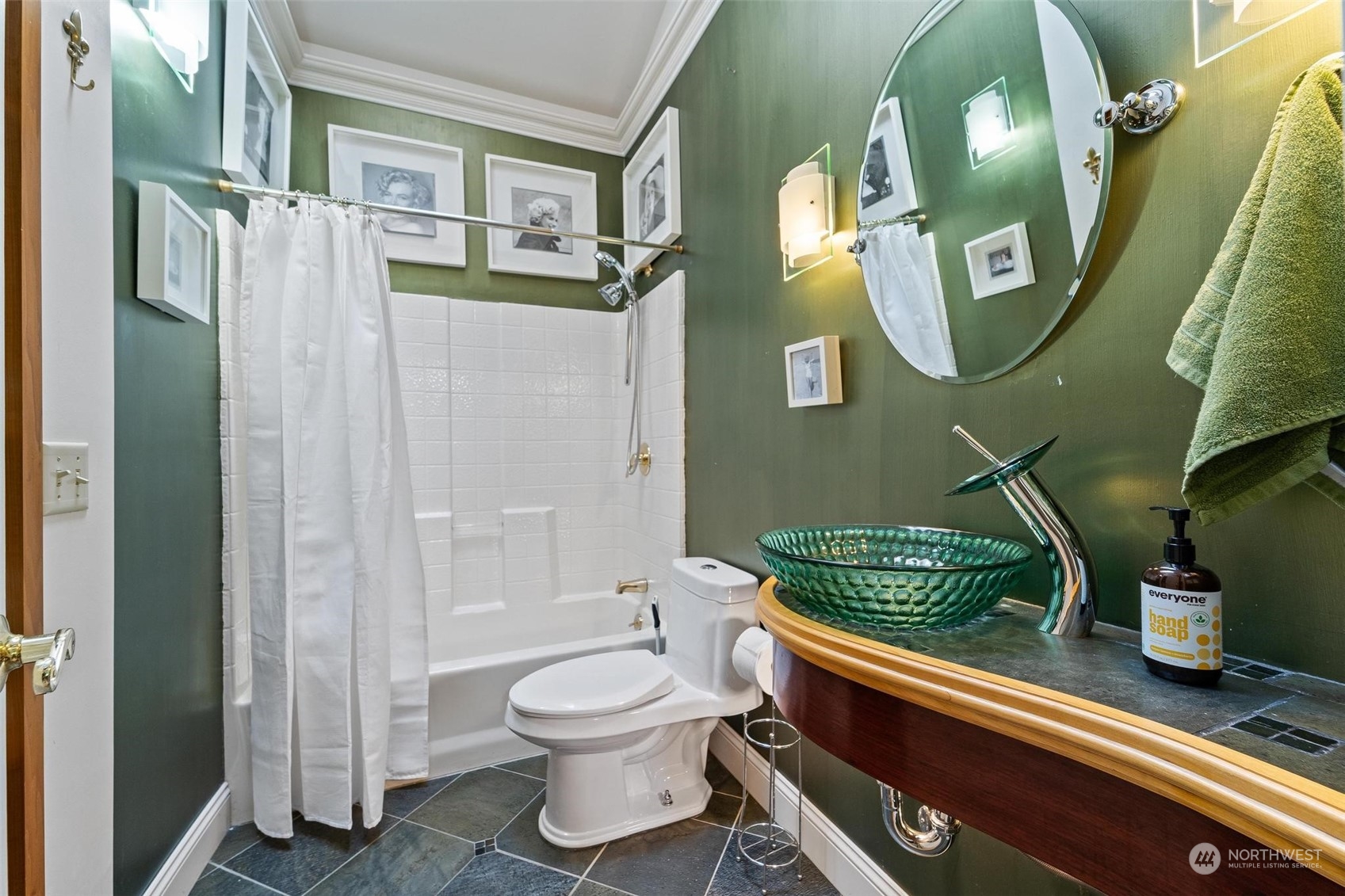 23220 49th Avenue Southeast Bothell, WA 98021 - Photo 19 of 40 a bathroom with a toilet a sink and mirror
