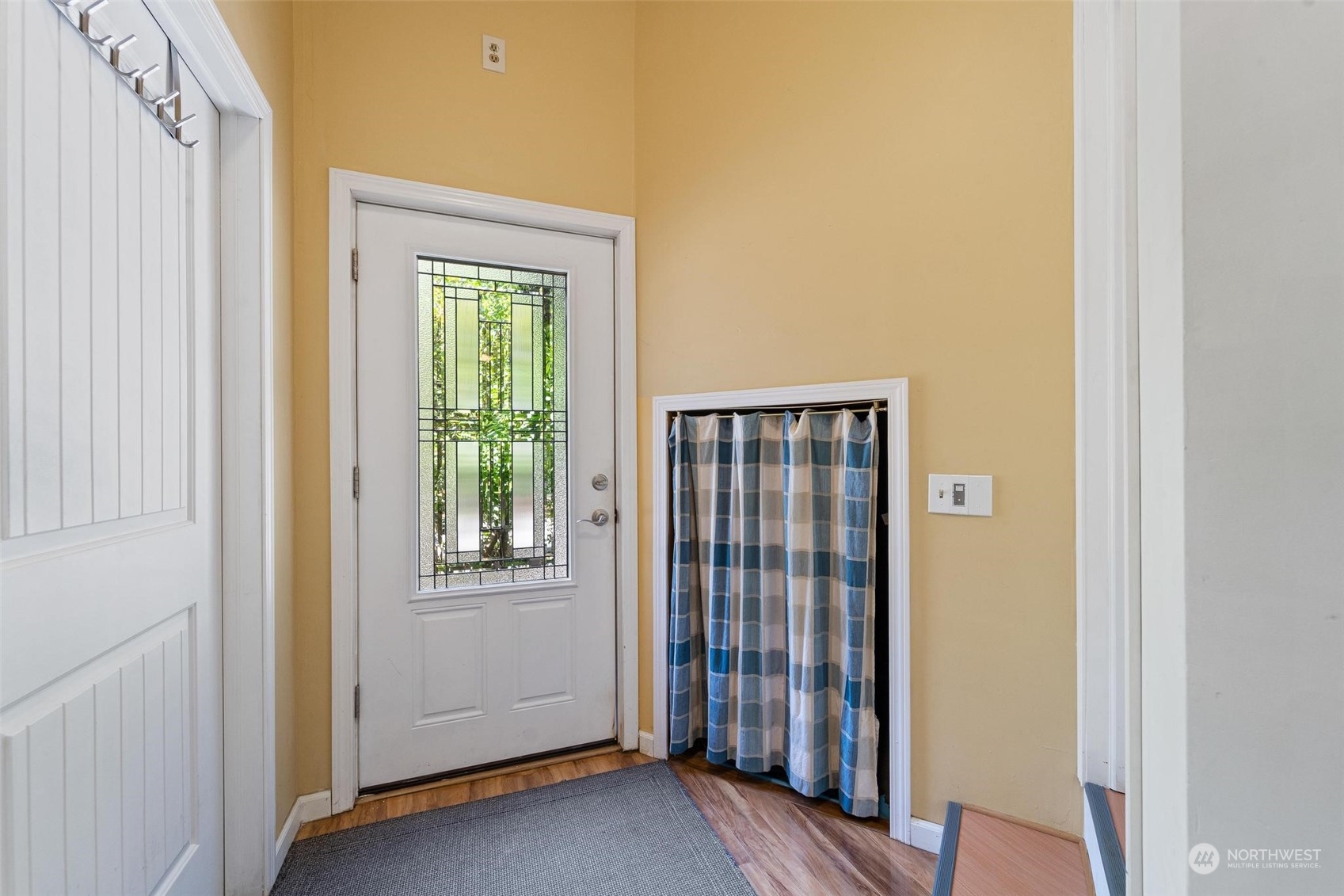 23220 49th Avenue Southeast Bothell, WA 98021 - Photo 28 of 40 a view of front door with wooden floor