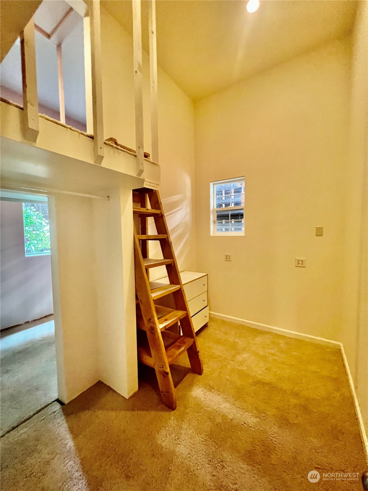 23220 49th Avenue Southeast Bothell, WA 98021 - Photo 34 of 40 a view of a room with wooden floor and windows