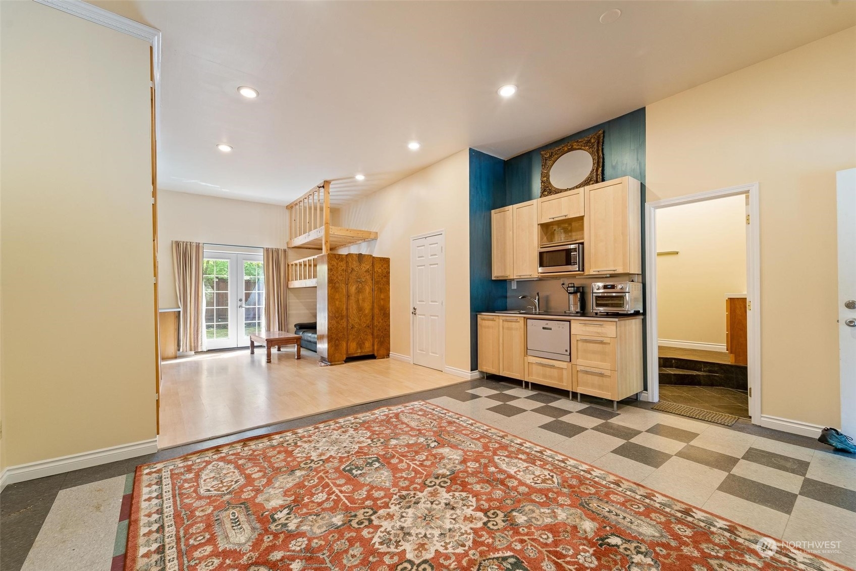 23220 49th Avenue Southeast Bothell, WA 98021 - Photo 5 of 40 a view of a hallway with a living room and dining room