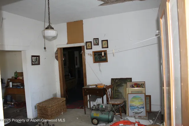 a view of a workspace with furniture