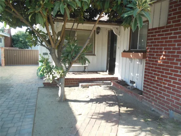 a view of a back yard of the house