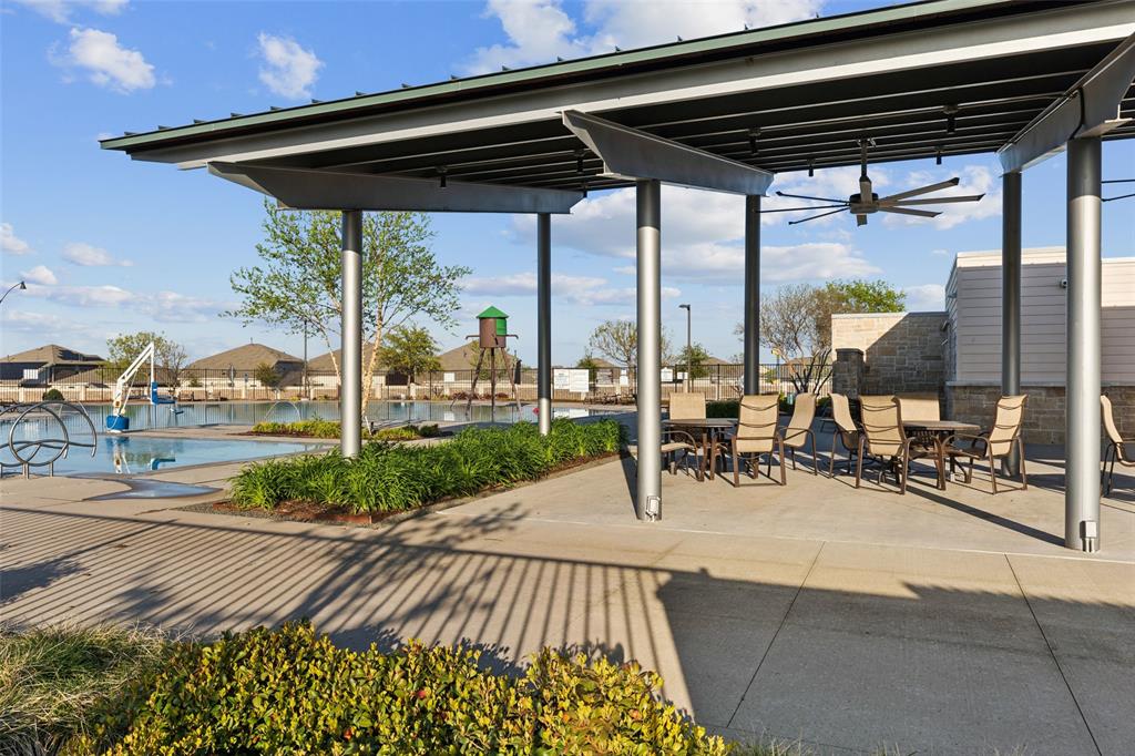 425 Sweetshade Lane Princeton, TX 75407 - Photo 25 of 29 a view of sitting area with chairs and table in the patio