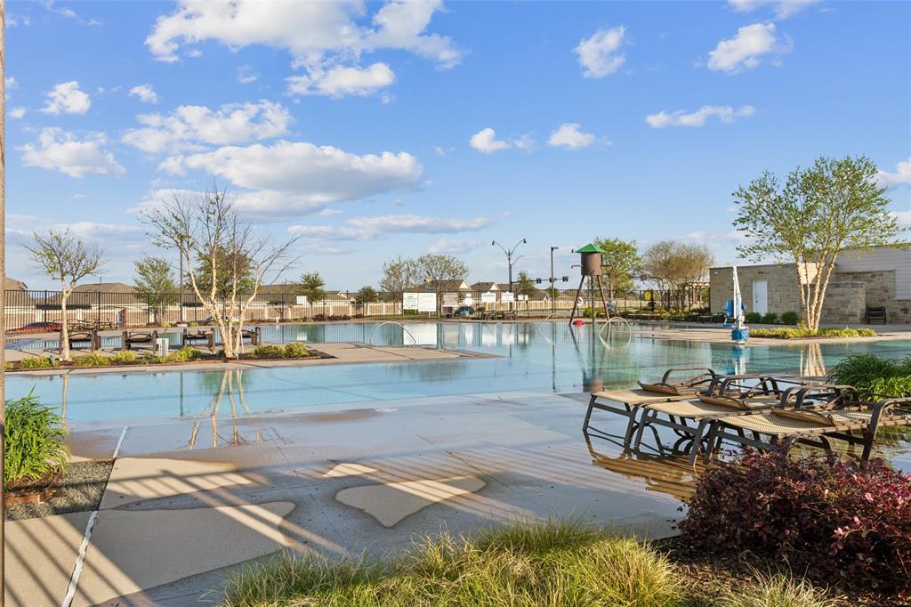 425 Sweetshade Lane Princeton, TX 75407 - Photo 26 of 29 a view of a lake with a terrace