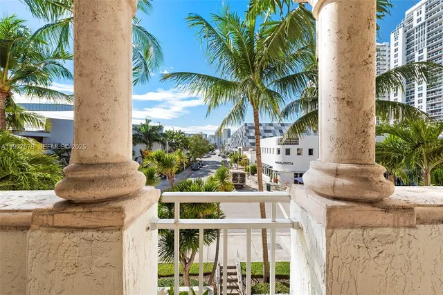 a view of balcony with furniture