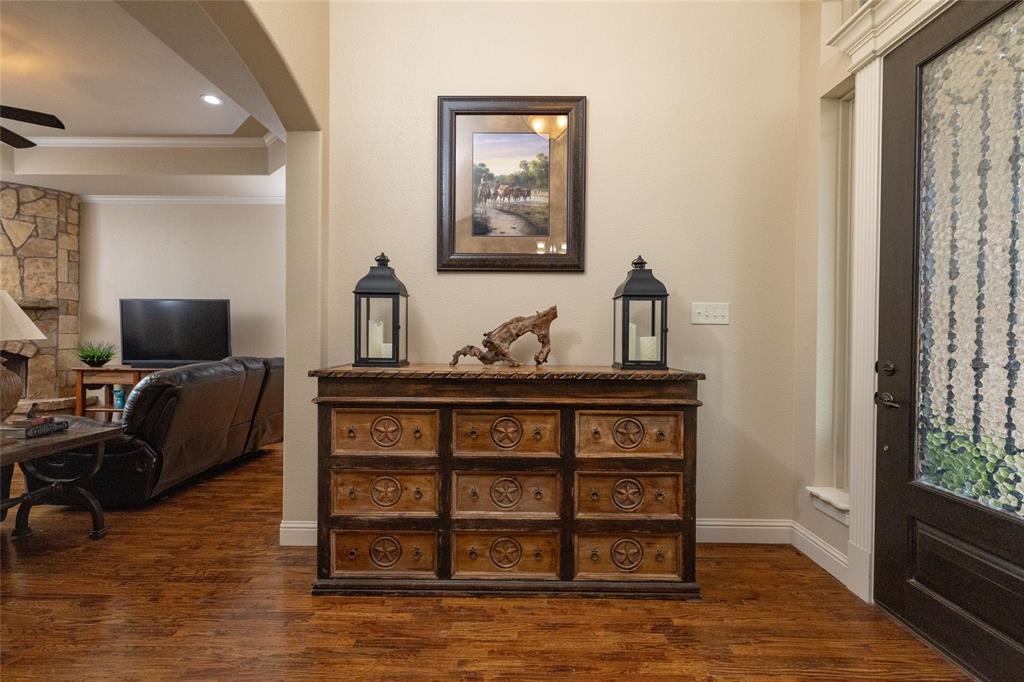 208 Ellis Creek Drive Weatherford, TX 76085 - Photo 11 of 40 a view of workspace with wooden floor outdoor space