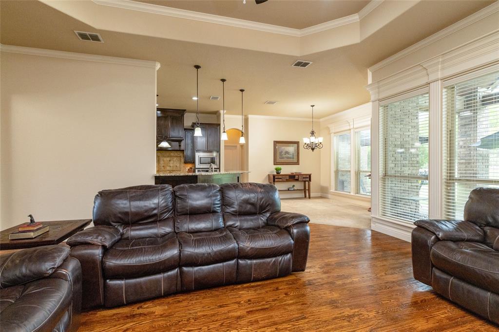 208 Ellis Creek Drive Weatherford, TX 76085 - Photo 15 of 40 a living room with furniture and a couch