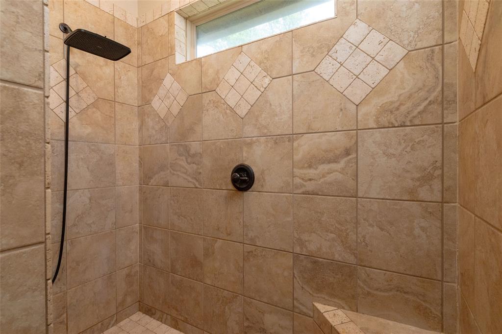 208 Ellis Creek Drive Weatherford, TX 76085 - Photo 26 of 40 a bathroom with a shower