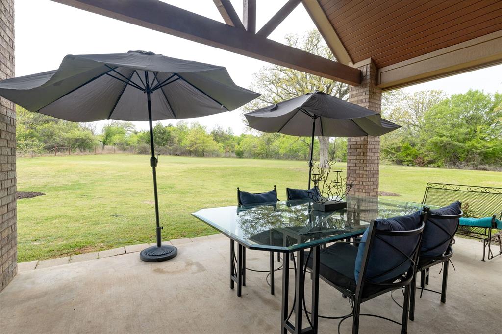 208 Ellis Creek Drive Weatherford, TX 76085 - Photo 32 of 40 a view of an outdoor seating an ocean view